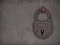 Padlock on a rusty steel plate Royalty Free Stock Photo