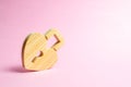 Padlock in the shape of a heart on a pink background. The secret of relationships and pickup rules. Strong love affair. Secrets Royalty Free Stock Photo