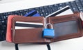 Padlock, wallet and credit cards on the computer keyboard. Credit card security Royalty Free Stock Photo