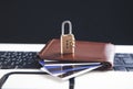 Padlock, wallet and credit cards on the computer keyboard. Credit card security Royalty Free Stock Photo