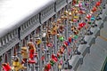 Padlocks on a bridge signify unending love