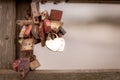 Some Padlocks in different colours hanging from a pier Royalty Free Stock Photo