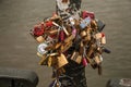 Padlocks fastened to each other on bridge of Paris