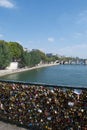 Padlocks love locks in bridge over River Seine in Paris, France Royalty Free Stock Photo