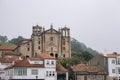 Padron, Spain - 10/20/2018: landmark od Padron in Galicia, Spain. Ancient temple with houses on Camino de Santiago way.