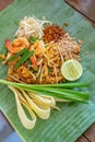 PadThai, The Traditional of Thailand Fried noodle with prawns on the banana leaf ready to serve for lunch