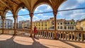 Padua -  Tourist woman enjoying the view on Piazza delle Erbe from the loggia of Palazzo della Ragione in Padua, Veneto, Italy Royalty Free Stock Photo