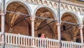 Padua -  Tourist woman enjoying the view on Piazza delle Erbe from the loggia of Palazzo della Ragione in Padua, Veneto, Italy Royalty Free Stock Photo