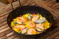 Paella in black pan Royalty Free Stock Photo