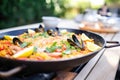 paella with crispy socarrat bottom in the pan Royalty Free Stock Photo