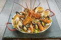 Paella with fresh lobster, scollops, mussels and prawn Royalty Free Stock Photo