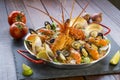 Paella with fresh lobster, scollops, mussels and prawn Royalty Free Stock Photo