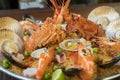 Paella with fresh lobster, scollops, mussels and prawn Royalty Free Stock Photo