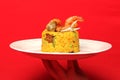 Paella rice is a traditional cuisine recipe from the city of Valencia Spain prepared with saffron, seafood, shrimp, vegetables ser