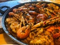 Paella with seafood and vegetables Royalty Free Stock Photo