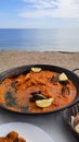 A Spanish dish on a beach Royalty Free Stock Photo