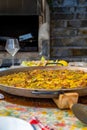 Paellera with a freshly cooked authentic Valencian paella Royalty Free Stock Photo