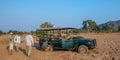 Game drive vehicle stuck in dry river sand