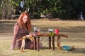 Pagan Priestess at Altar with Wine