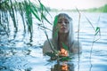 Pagan scene in lake, magical rituals Royalty Free Stock Photo