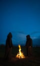 Pagans worshipping around a fire