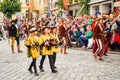 Page boys in medieval costumes