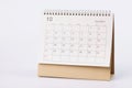 Page with dates of october is open on desk calendar closeup Royalty Free Stock Photo