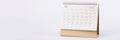 Page with dates of october is open on desk calendar closeup Royalty Free Stock Photo