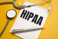 Page with HIPAA The Health Insurance Portability and Accountability Act of 1996 on the table with stethoscope, medical concept Royalty Free Stock Photo