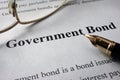 Page of newspaper with words government bonds. Royalty Free Stock Photo
