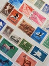 page from a philatelic catalog with many old stamps