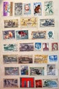 page from a philatelic catalog with many old stamps