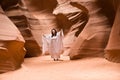 a japanese singer performs in the famous slot canyon in Page, USA