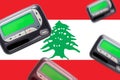 Pagers on the background of the flag of Lebanon Royalty Free Stock Photo