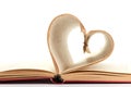 Pages of a book curved into heart