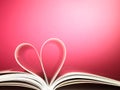 Pages of a book curved into a heart shape Royalty Free Stock Photo