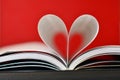 Pages of a book curved into a heart shape Royalty Free Stock Photo