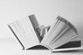 Pages of a book curved into a heart shape Royalty Free Stock Photo