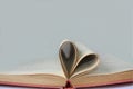 Pages of a book curved into a shape heart Royalty Free Stock Photo