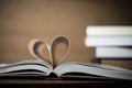 Pages of a book forming the shape of the heart. Love concept. Royalty Free Stock Photo