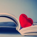 Pages of an open book and heart. Royalty Free Stock Photo