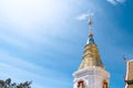 Pagoda on bright blue sky background at reclining buddha mother