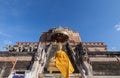 Pagoda and buddha statue at Wat Chedi Luang temple in Chiang Mai Royalty Free Stock Photo