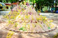 Pagoda and flower on sand in Songkran day festival , Thailand. Royalty Free Stock Photo