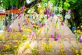 Pagoda and flower on sand in Songkran day festival , Thailand. Royalty Free Stock Photo