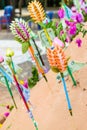 Pagoda and flower on sand in Songkran day festival , Thailand. Royalty Free Stock Photo