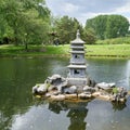 Pagoda in a lake in a Chinese garden Royalty Free Stock Photo