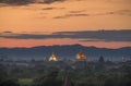 Pagoda landscape of Bagan in misty morning under a warm sunrise in the plain of Bagan Myanmar. Royalty Free Stock Photo