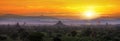 Pagoda landscape of Bagan in misty morning under a warm sunrise in the plain of Bagan Myanmar. Royalty Free Stock Photo