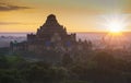 Pagoda landscape of Bagan in misty morning under a warm sunrise in the plain of Bagan Myanmar. Royalty Free Stock Photo